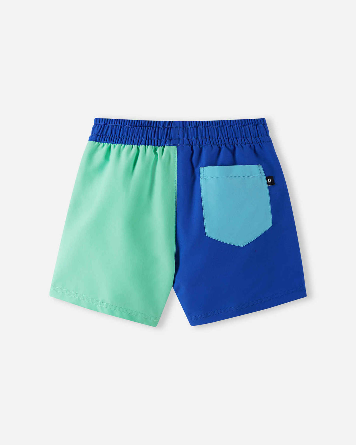Back view of the Reima Palmu kids' UPF 50+ board shorts in sparkly blue and mint green, featuring a handy light blue patch pocket on the back and a secure, flexible elastic waistband.