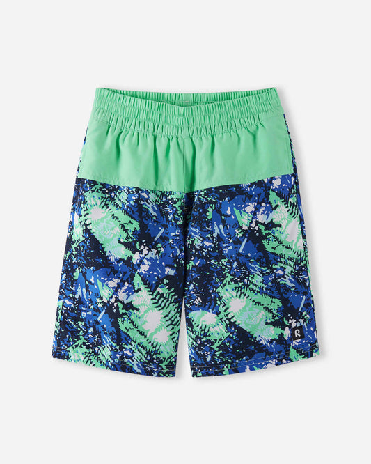 Front view of the Reima Papaija boys' UPF 50+ sunproof swim shorts, featuring a vibrant fresh mint green waistband and an abstract blue and green tropical print, made with quick-drying fabric.