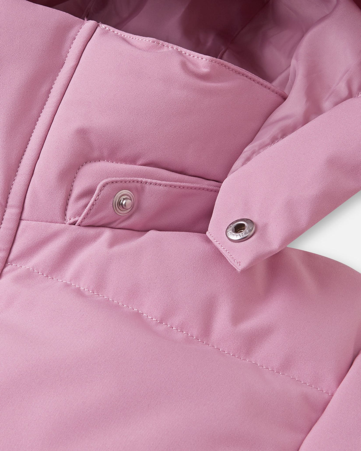 Detailed close-up of the metallic safety snaps along the collar of the grey pink Reima Parkkala kids' puffer coat, a safety feature designed to allow the hood to detach easily if caught during outdoor winter play.