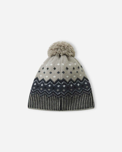 Back flat lay view of the black and charcoal Reima Pohjoinen kids' merino wool winter hat, showing the seamless wrap-around geometric Scandinavian pattern and cozy top pom-pom.