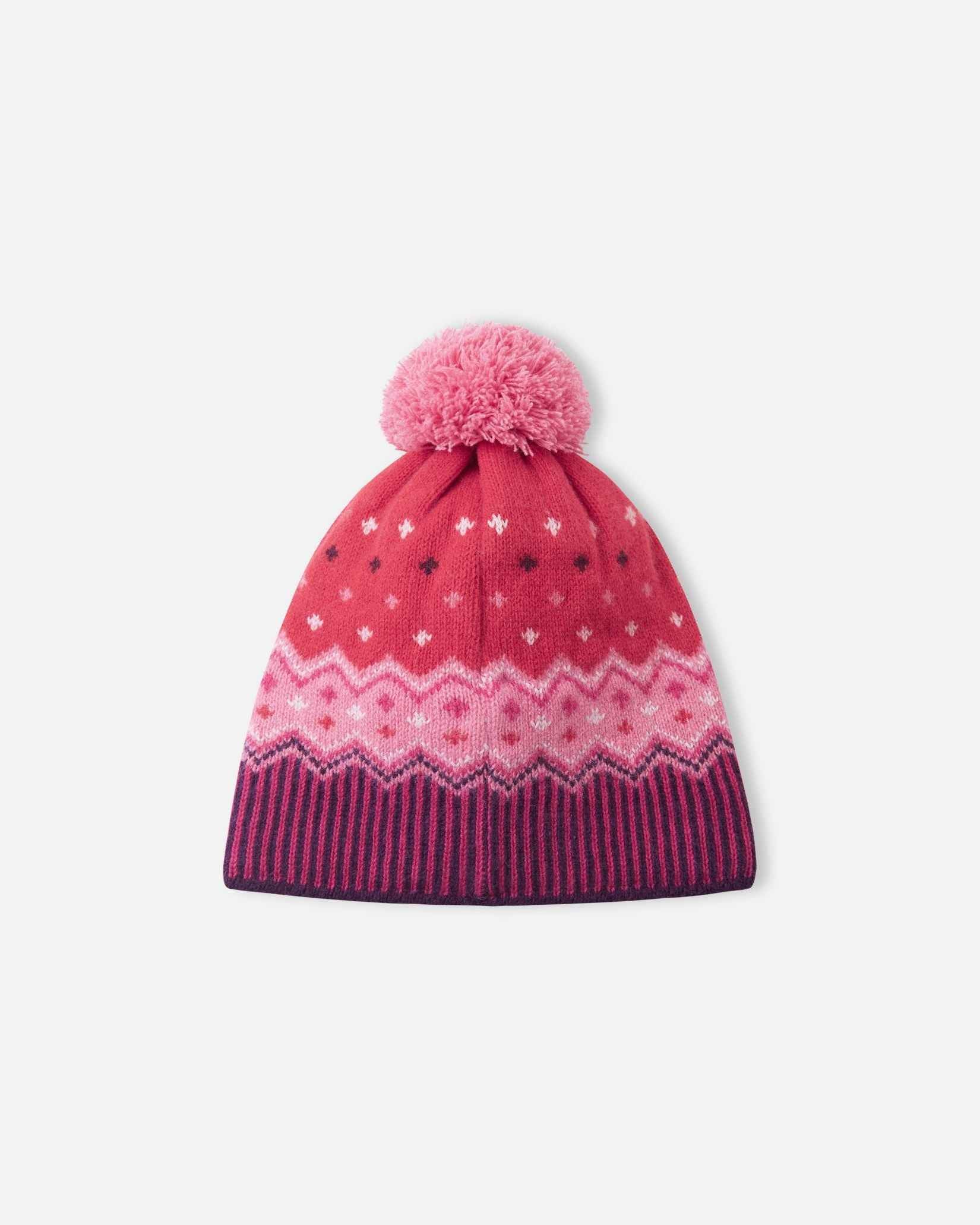 Back flat lay view of the deep purple Reima Pohjoinen kids' merino wool winter hat, showing the seamless wrap-around geometric Scandinavian pattern and cozy pink top pom-pom.