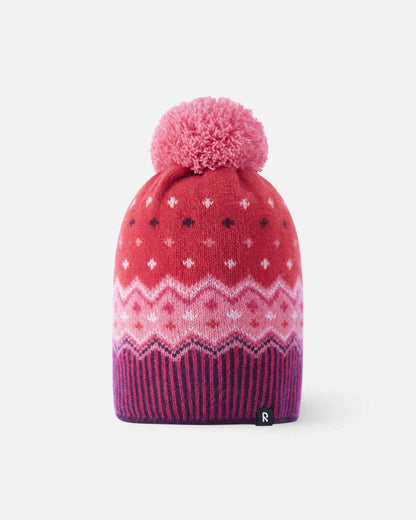 Front flat lay view of the deep purple Reima Pohjoinen kids' merino wool winter beanie, featuring a traditional Nordic jacquard snowflake pattern in pink and magenta, a ribbed hem, a fluffy yarn pom-pom, and a subtle reflective logo tag.