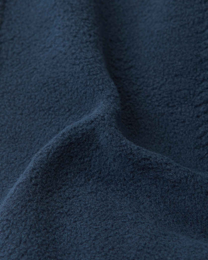 Close-up of the soft navy blue thermal fleece lining inside the Reima Pohjoinen kids' merino wool beanie, engineered for itch-free comfort, wind resistance, and maximum heat retention.
