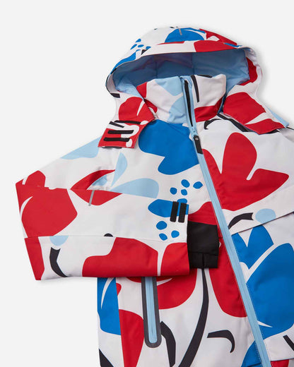Angled presentation of the Reima Posio youth winter ski apparel, highlighting the smooth-gliding front zipper, weather-blocking high collar, and adjustable snow-proof cuffs.
