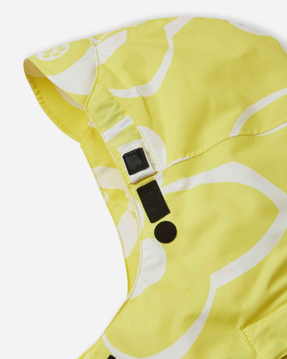 Close-up of the secure velcro hood attachment system on the back collar of the yellow Reima Posio kids' waterproof winter ski jacket.