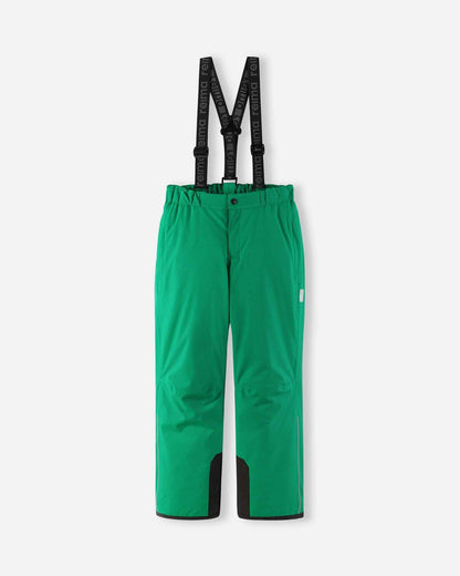 Front flat lay view of the bright green Reima Proxima kids' winter ski pants, featuring adjustable Reima-branded black suspenders, a zippered fly, and durable black reinforced hems designed for alpine skiing.