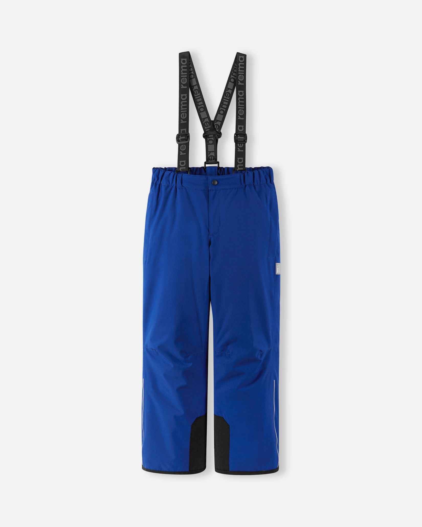 Front flat lay view of the twilight blue Reima Proxima kids' winter ski pants, featuring adjustable Reima-branded black suspenders, a zippered fly, and durable black reinforced hems designed for alpine skiing.