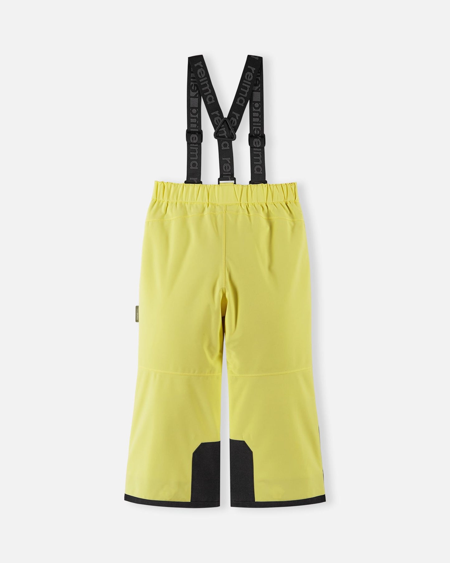 Back flat lay view of the bright yellow Reima Proxima kids' ski pants, showcasing the clean lines, elastic waistband, and heavy-duty black reinforced lower legs built to withstand heavy wear and tear on the mountain.