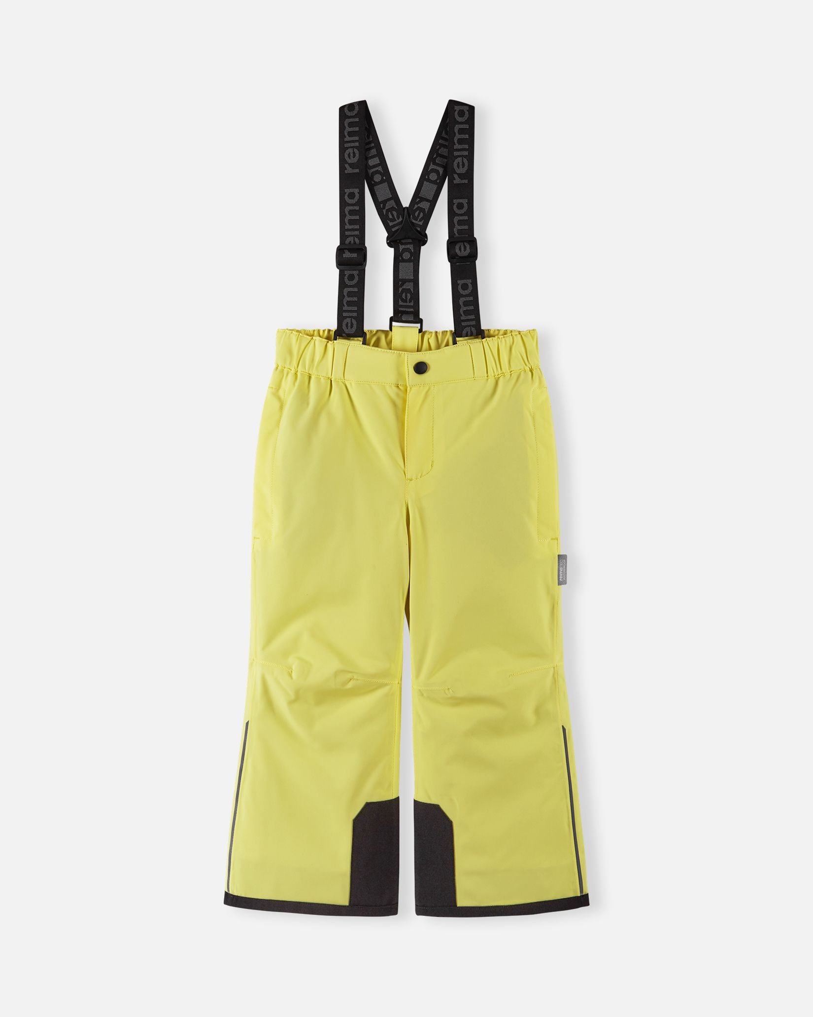 Front flat lay view of the bright yellow Reima Proxima kids' winter ski pants, featuring adjustable Reima-branded black suspenders, a zippered fly, and durable black reinforced hems designed for alpine skiing.