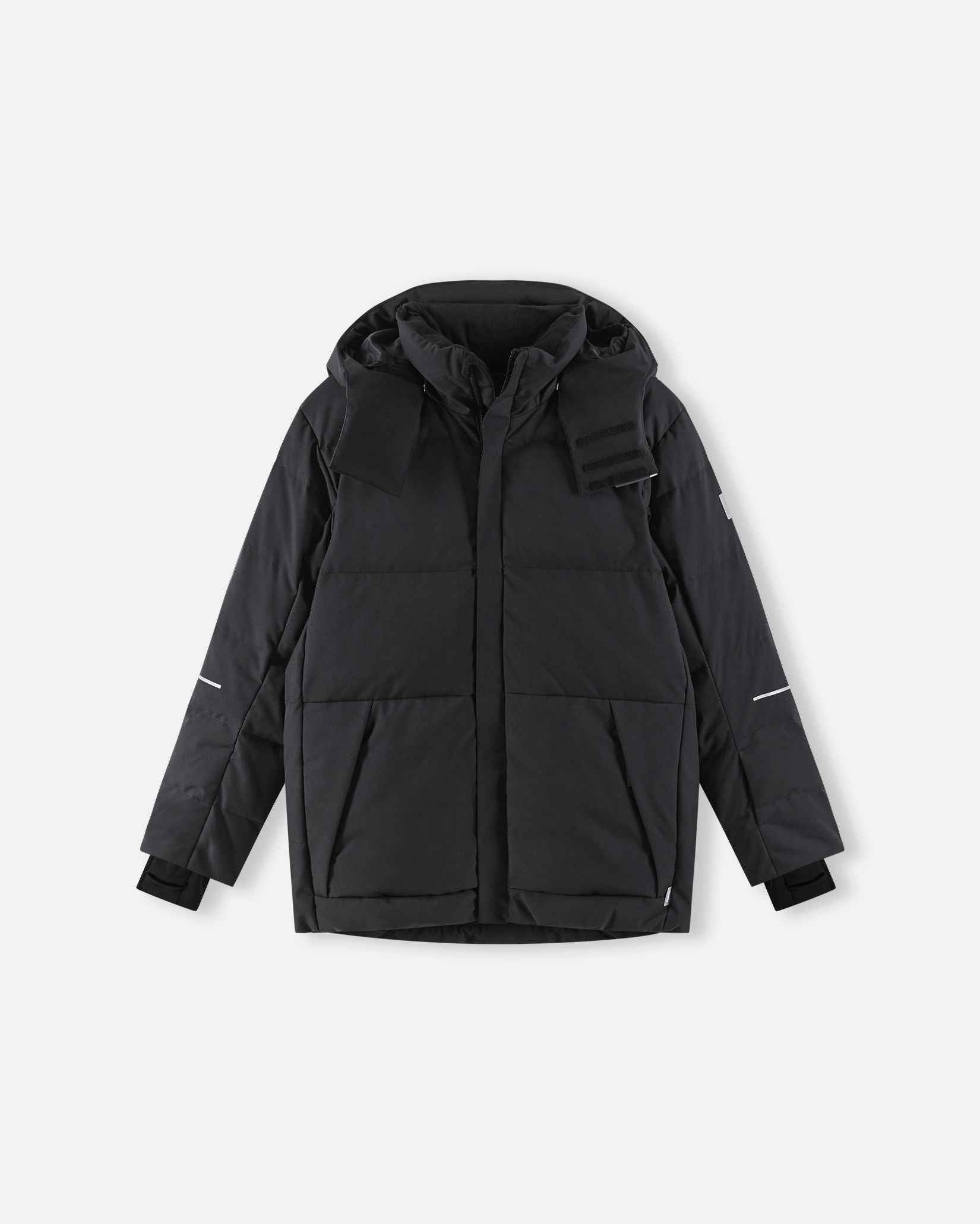 The primary product photograph of the warm Reima Ranua kids' down ski jacket in black, showcasing a complete front view with thick down insulation quilting, an insulated hood, and adjustable cuffs.