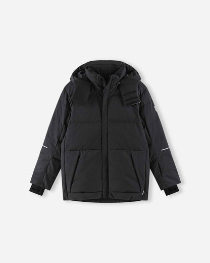 The primary product photograph of the warm Reima Ranua kids' down ski jacket in black, showcasing a complete front view with thick down insulation quilting, an insulated hood, and adjustable cuffs.