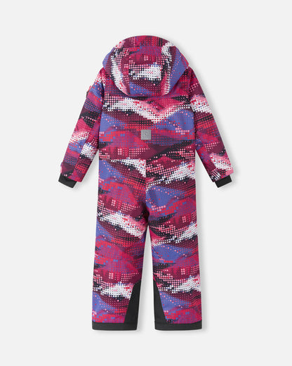 Full back view of the Reima Reach girls' ski suit in a vibrant rosy berry geometric pattern, highlighting the attached winter hood, a high-visibility reflective safety patch centered on the back, and heavy-duty black reinforced seat and ankle panels.