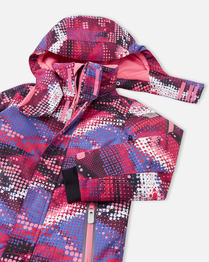 Detailed upper front view of the rosy berry Reima Reach girls' waterproof ski suit, highlighting the protective winter hood, cozy pink fleece-lined high collar, and durable zippers designed to keep out harsh winter winds.
