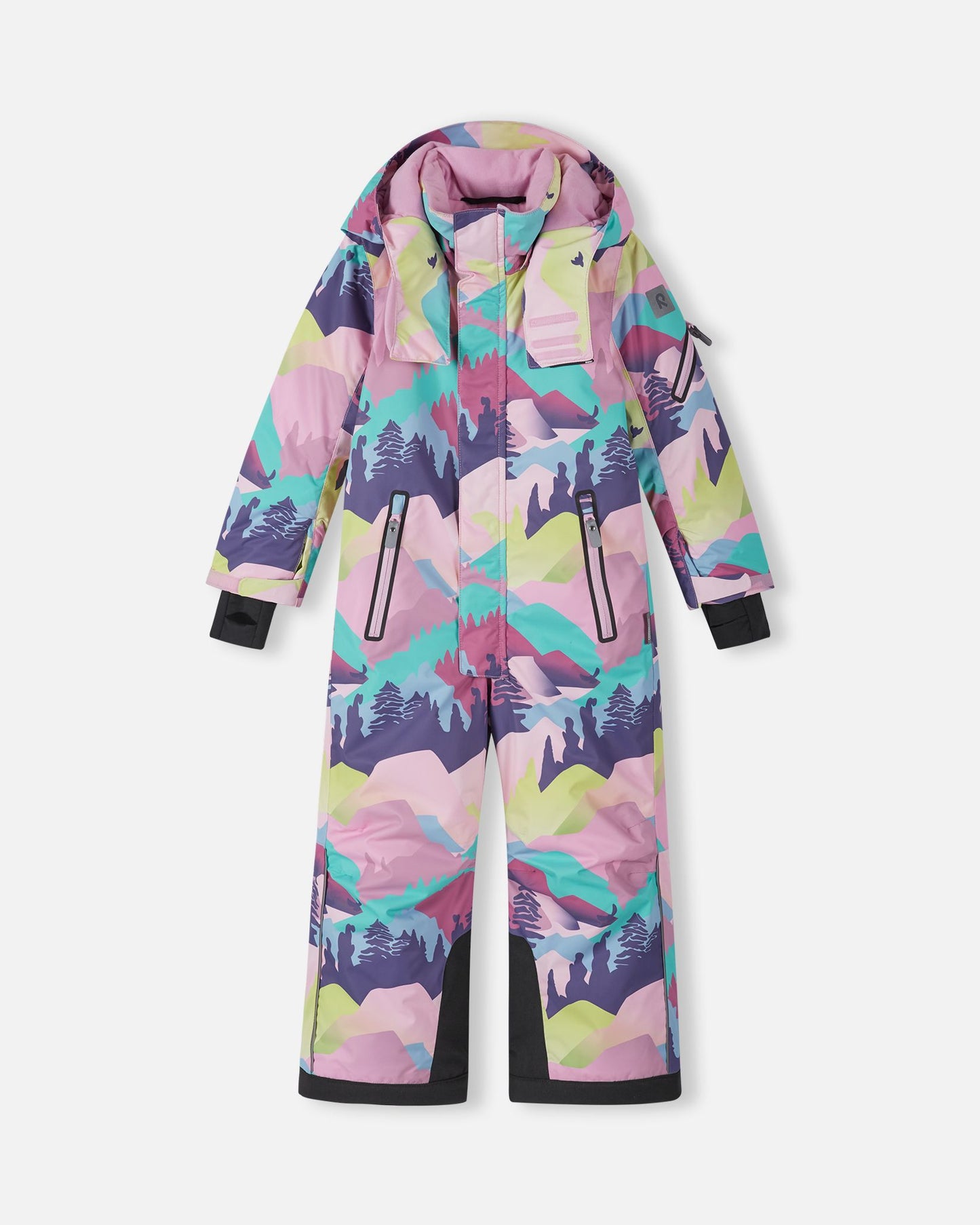 Front view of the Reima Reach kids' ski suit featuring a colorful grey, pink, and purple mountain landscape print, equipped with zippered chest pockets, reinforced black leg hems, and a protective winter hood designed for snow sports.