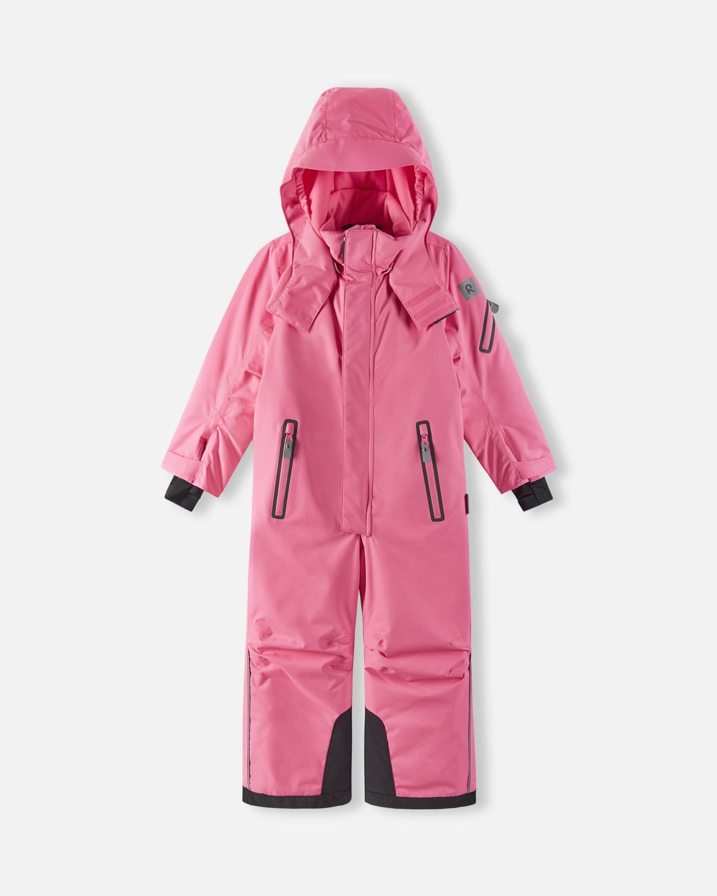 Front view of the soft coral Reima Reach kids' ski suit with the helmet-compatible hood pulled up, showcasing the protective high collar designed to keep children warm in harsh winter climates.