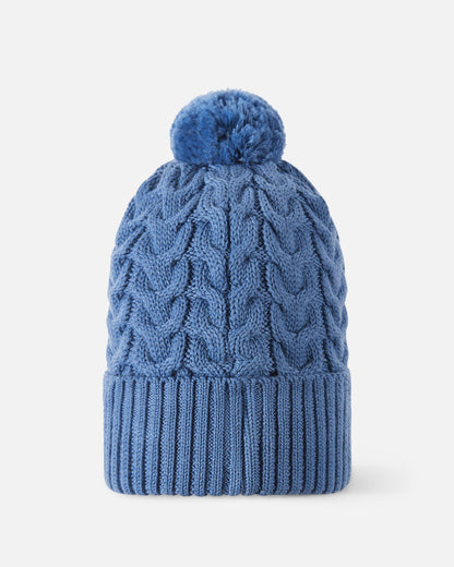 Back flat lay view of the blue ocean Reima Routii kids' knitted beanie, showcasing the seamless continuation of the traditional cable knit pattern and the soft yarn pom-pom engineered for cold weather warmth.