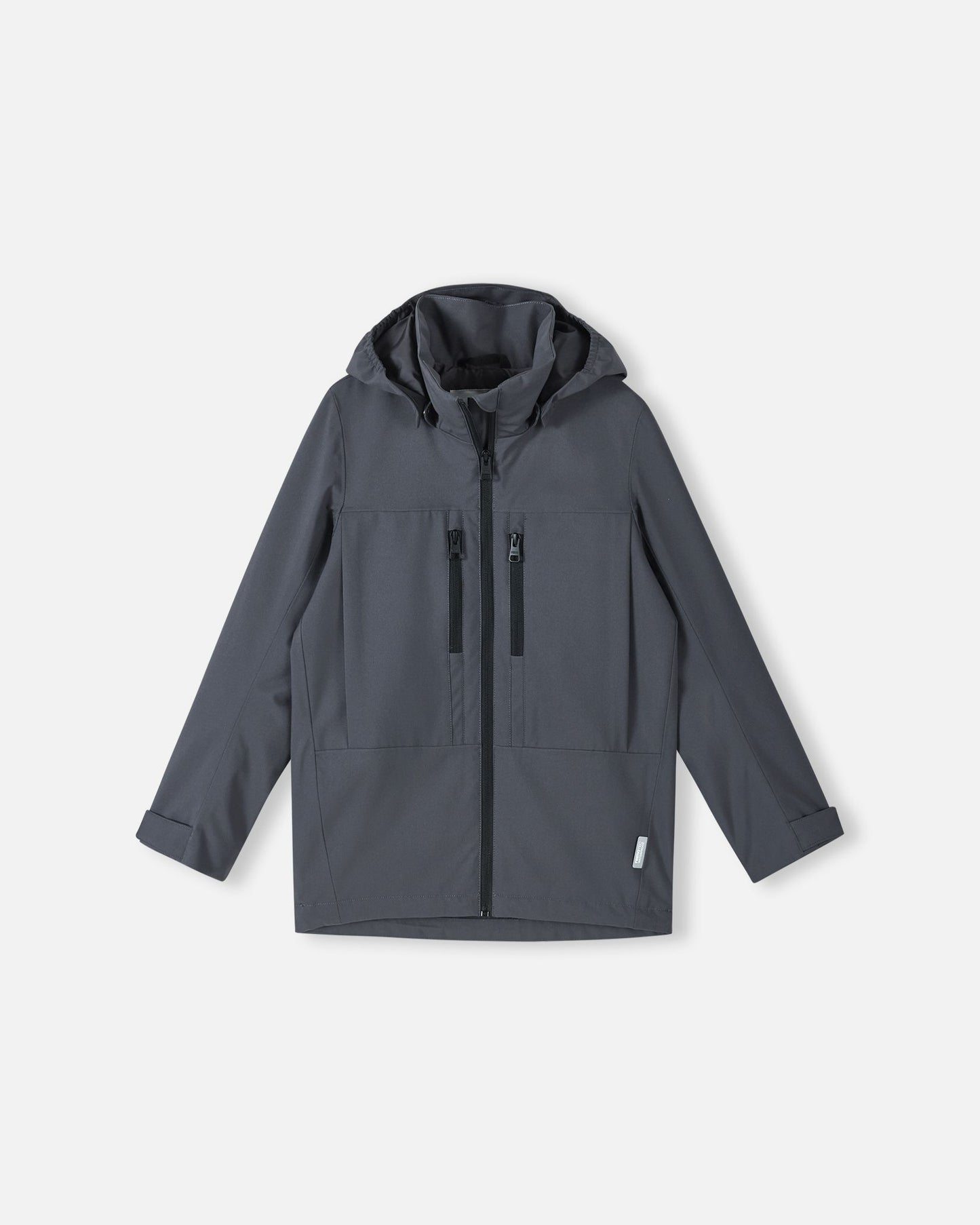 Front view of the Reima Saarela kids waterproof jacket in soft black, featuring a full front zip, protective hood, and two zippered chest pockets.