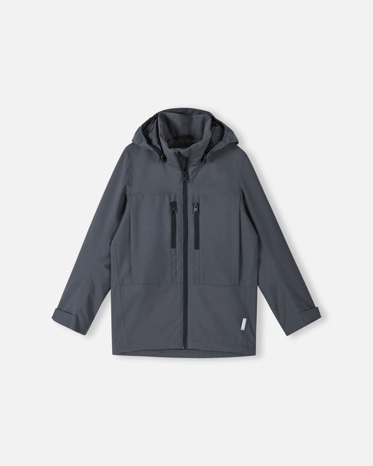 Front view of the Reima Saarela kids waterproof jacket in soft black, featuring a full front zip, protective hood, and two zippered chest pockets.