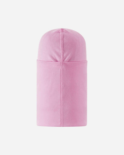 Back flat lay view of the pale rose Reima Salassa kids' wool base layer balaclava, showcasing the smooth, contoured construction designed to fit comfortably under a heavy winter beanie or alpine ski helmet.