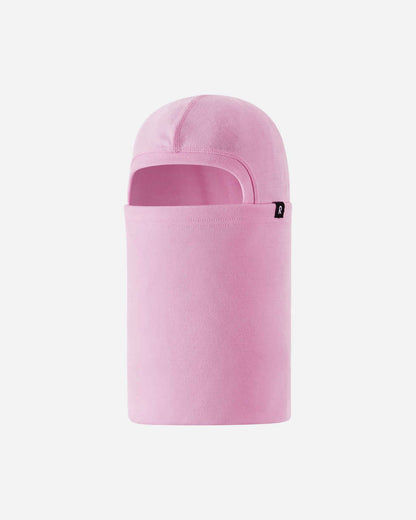 Front flat lay view of the pale rose Reima Salassa kids' 100% wool balaclava. The image highlights the snug face opening and extended neck coverage, making it an ideal thermal base layer for winter sports and outdoor play.