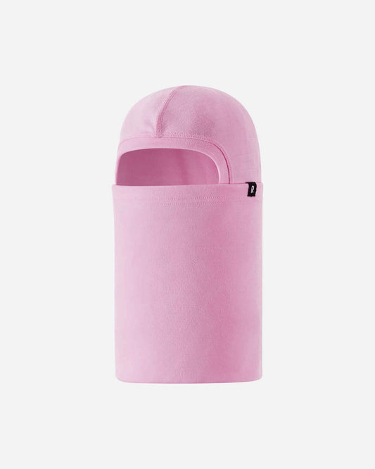 Front flat lay view of the pale rose Reima Salassa kids' 100% wool balaclava. The image highlights the snug face opening and extended neck coverage, making it an ideal thermal base layer for winter sports and outdoor play.
