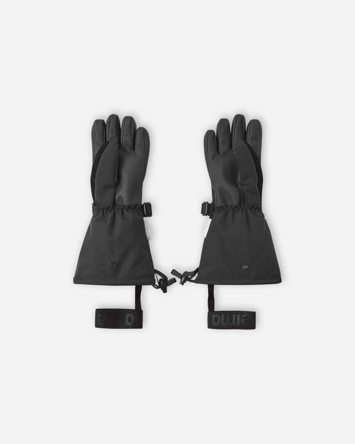 Flat lay view of the palms of the black Reima Skimba kids' ski gloves, showcasing the durable reinforced gripping surface on the fingers and palms designed for securely holding ski poles.