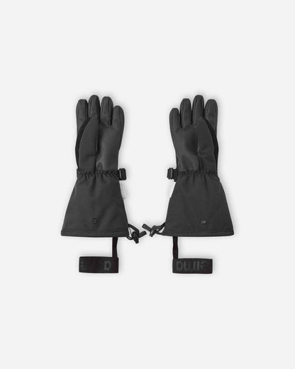 Flat lay view of the palms of the black Reima Skimba kids' ski gloves, showcasing the durable reinforced gripping surface on the fingers and palms designed for securely holding ski poles.