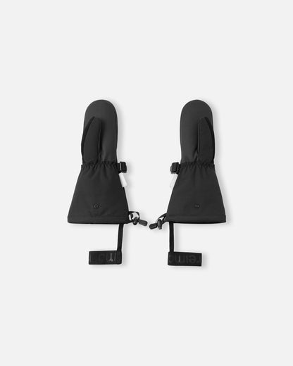 Flat lay view of the palms of the black Reima Snoukka kids' ski mittens, showcasing the durable reinforced gripping surface on the palms and thumbs specifically designed for securely holding ski poles.