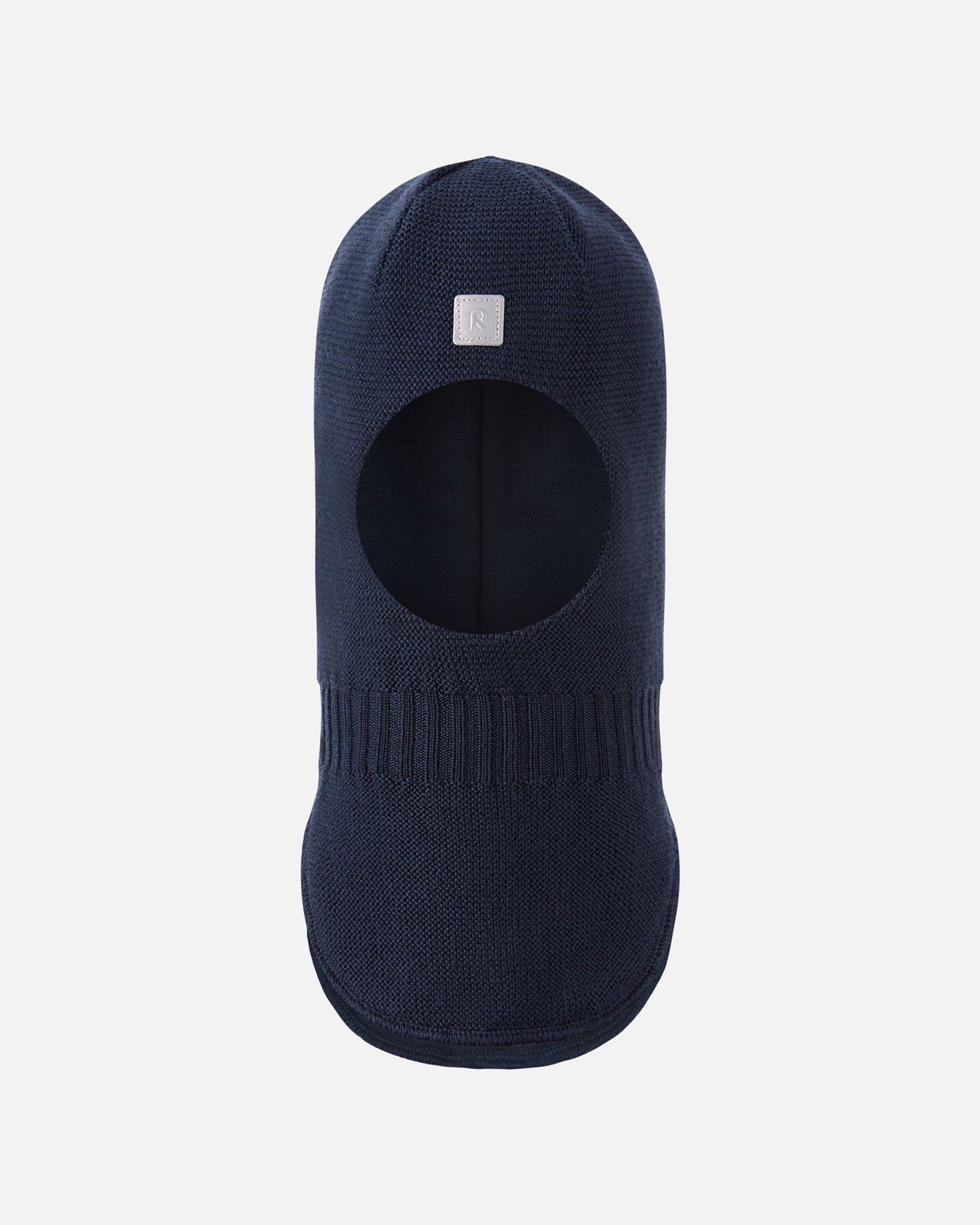 Full front view of the navy blue Reima Starrie toddler merino wool ski mask, showing the soft face opening and extended chest panel for optimal winter thermal protection.