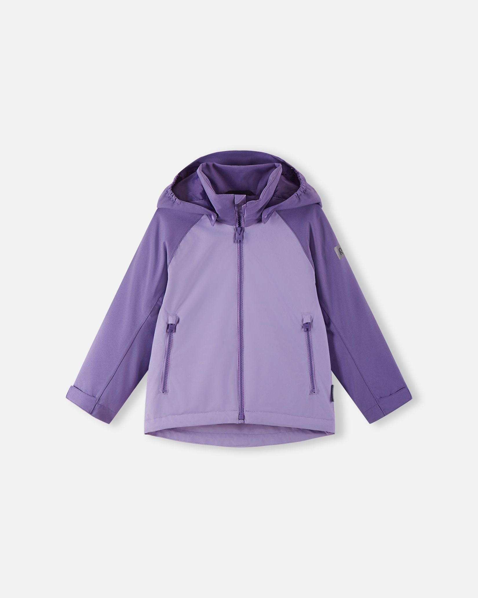 Front view of the Reima Sulkava girls' fall jacket featuring a two-tone blooming lilac design, complete with a full-length zipper, secure zippered pockets, and a protective hood for autumn weather.