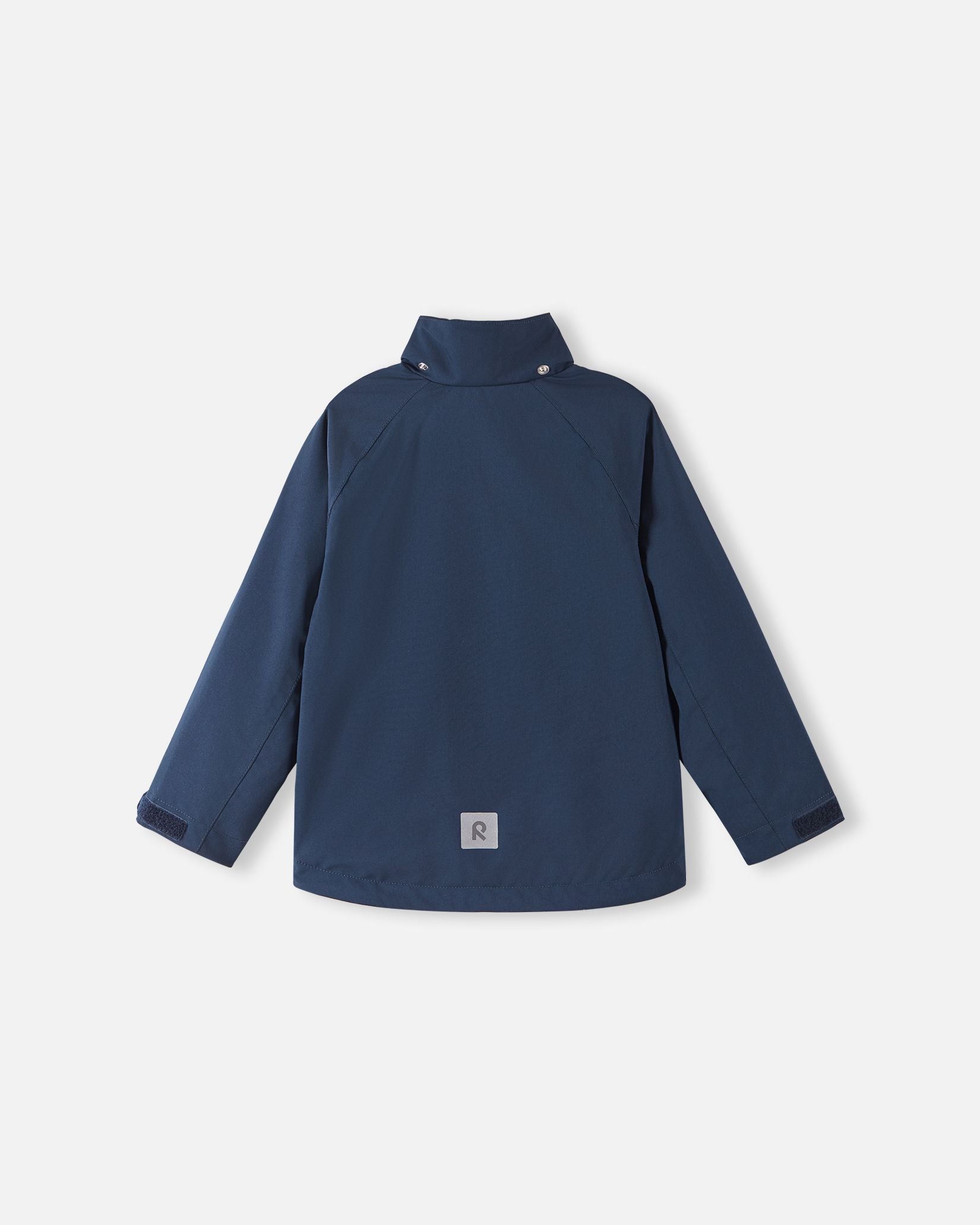 Back view of the navy blue Reima Sulkava kids' fall jacket with the detachable hood unfastened, showing the high stand collar that shields the neck from cold autumn breezes.