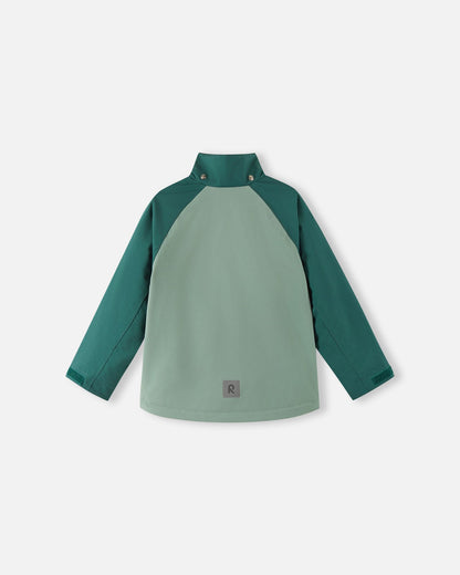 Back view of the two-tone stone green Reima Sulkava kids' fall jacket with the detachable hood removed, revealing a protective high stand collar designed to shield the neck from chilly autumn winds.