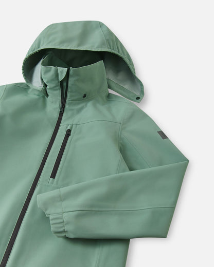Close-up view of the upper chest and hood on the Reima Suojala kids' stone green shell jacket, showing the breathable mesh lining and protective high collar designed to block wind and rain.