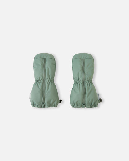 Front view of a pair of stone green Reima Tassuin woven toddler mittens, featuring full-length top zippers for easy dressing and elastic gathered wrists to keep snow out during winter play.