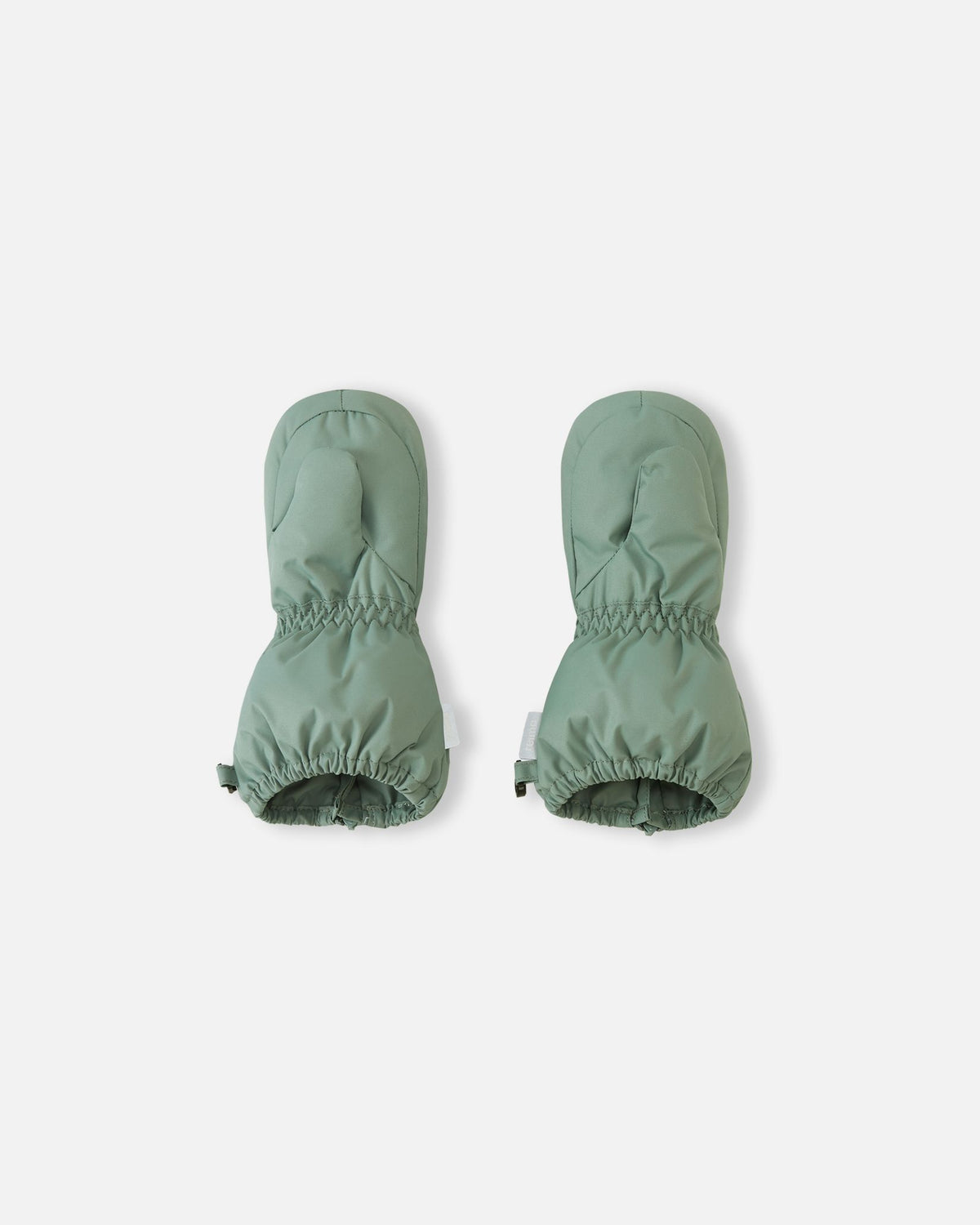 Palm side view of the stone green Reima Tassuin toddler winter mittens, highlighting the durable woven exterior, tailored thumb inserts, and stretchy elastic cuffs designed for a secure fit on small hands.