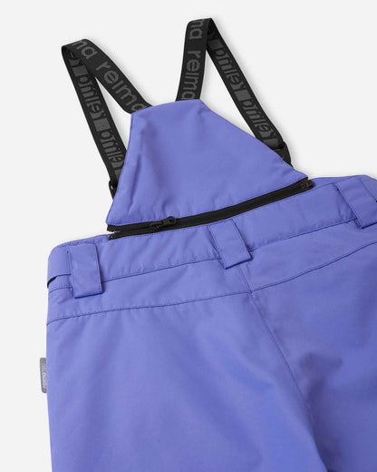 Detail view of the upper back on the breezy violet Reima Terrie kids' snow pants, featuring the stretchy high-back panel for extra core warmth, belt loops, and sturdy Reima-branded elastic suspenders.