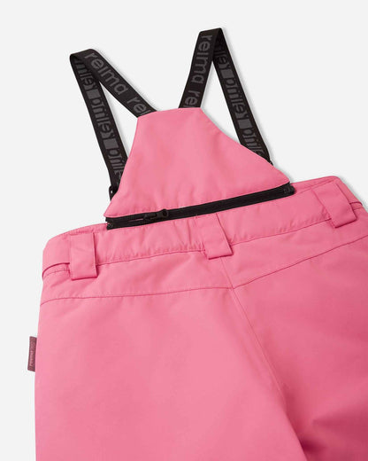 Detail view of the upper back on the soft coral Reima Terrie kids' snow pants, featuring the stretchy high-back panel for extra core warmth, belt loops, and sturdy Reima-branded elastic suspenders.