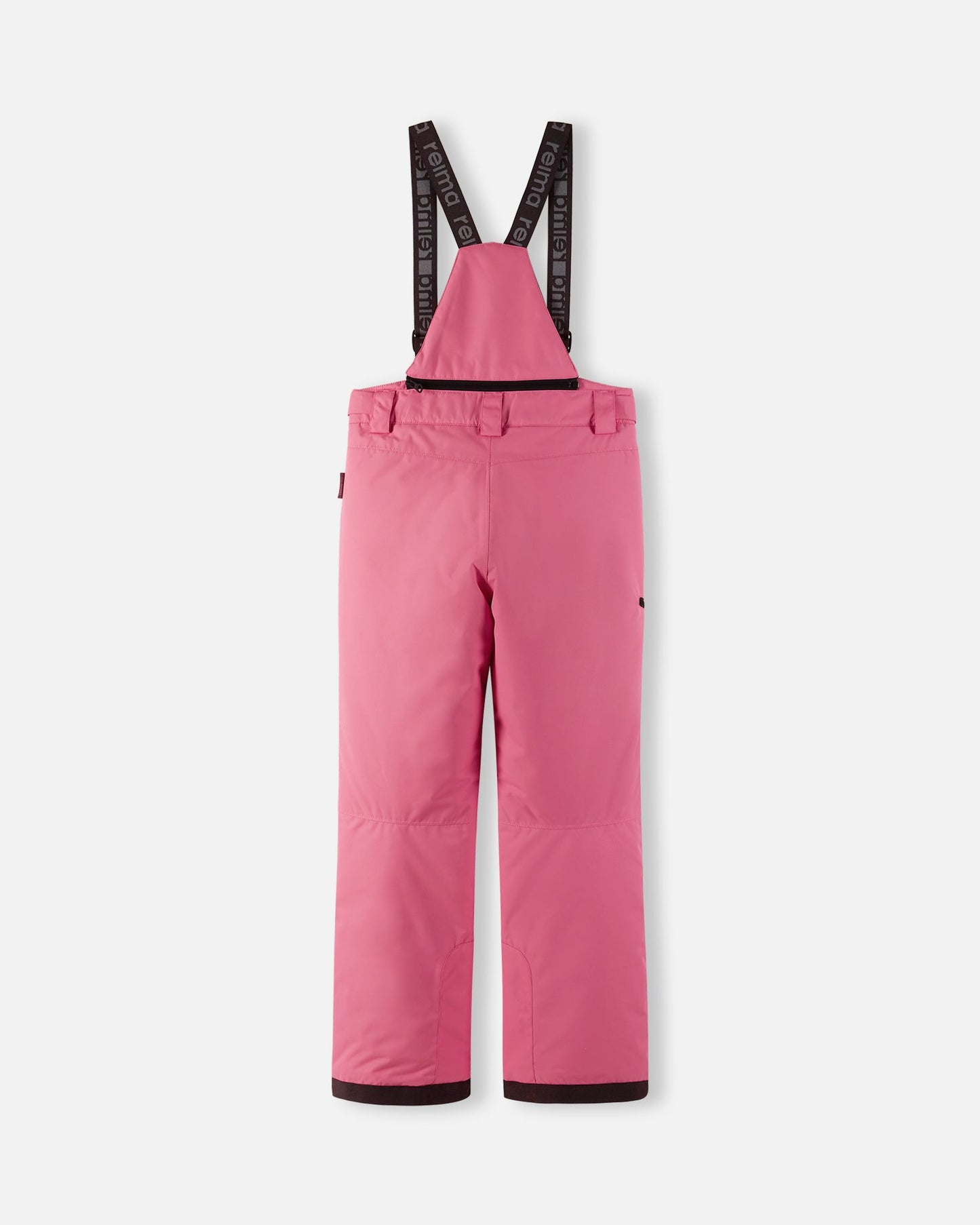Back flat lay view of the soft coral Reima Terrie kids' ski pants, showcasing the high-back coverage, elastic waistband, and heavy-duty reinforced lower legs built for rugged winter sports.