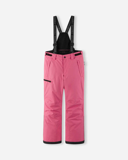 Front flat lay view of the soft coral pink Reima Terrie kids' winter snow ski pants, featuring adjustable Reima-branded suspenders, a zippered thigh pocket, and durable waterproof construction designed for alpine skiing and snowboarding.