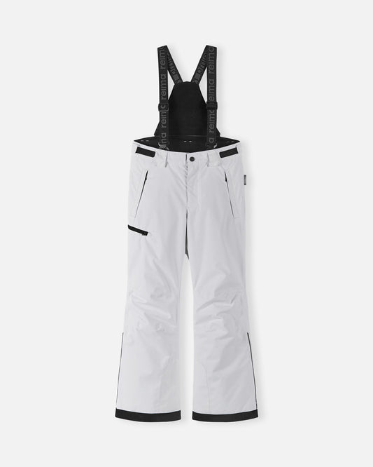 Front flat lay view of the crisp white Reima Terrie kids' winter snow ski pants, featuring adjustable Reima-branded black suspenders, a zippered thigh pocket, and durable waterproof construction designed for alpine skiing and snowboarding.