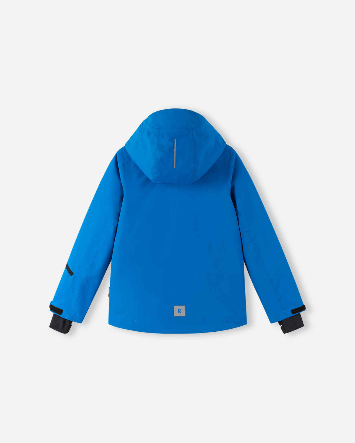 Rear flat lay view of the bright blue Reima Tieten children's ski coat, displaying a clean, seam-sealed design with a safety reflective patch on the lower hem and a protective winter hood.