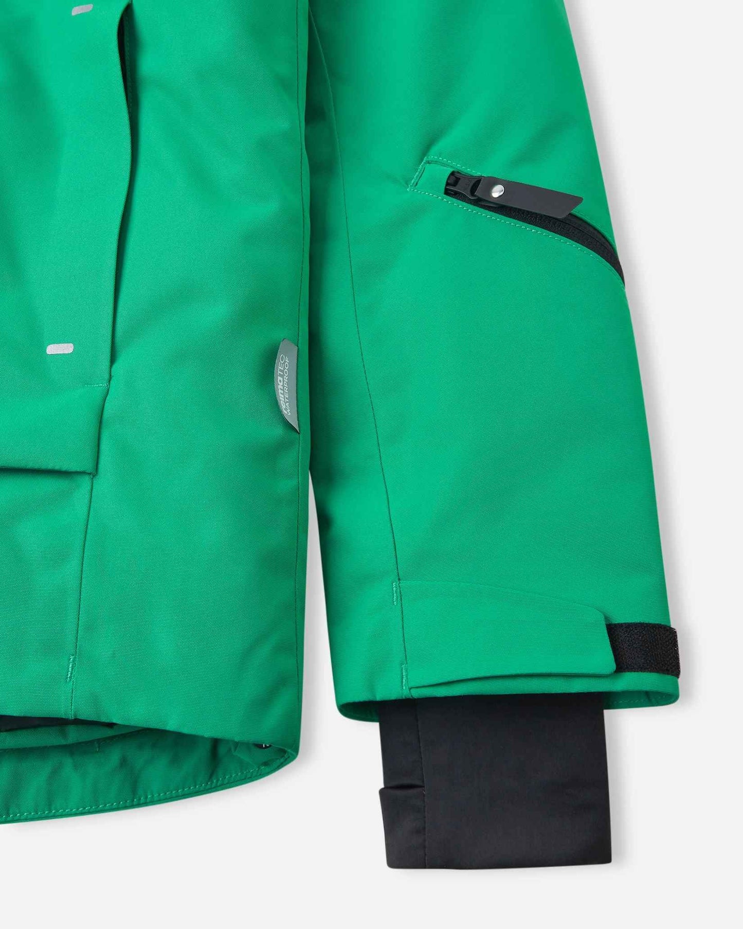 A black inner cuff extends from the green sleeve of the kids winter coat.