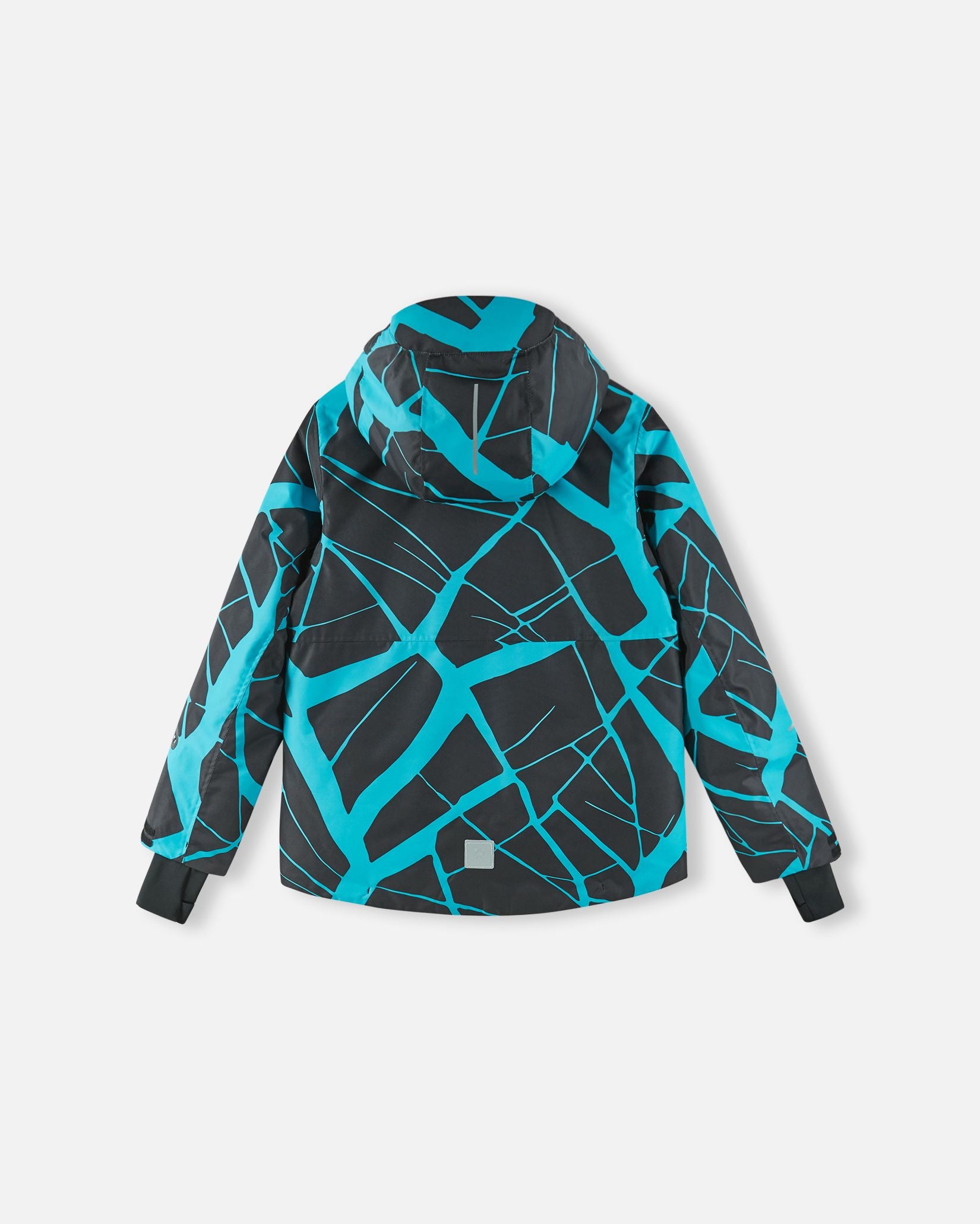 Back view of the black Reima Tirro kids' waterproof ski jacket, displaying the continuous blue geometric print, protective hood, and a reflective safety patch at the lower hem.