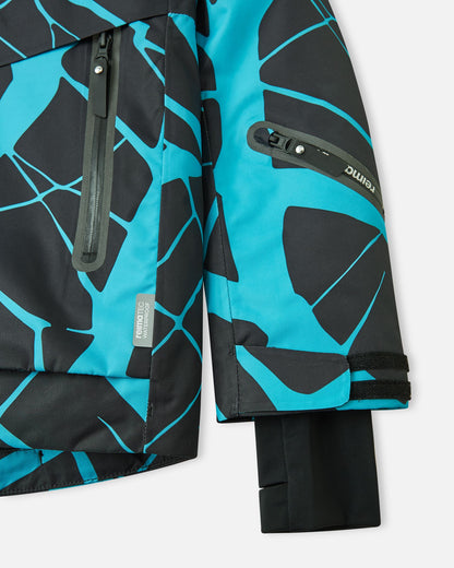 Detail view of the waterproof zippered sleeve ski pass pocket, velcro cuff adjuster, and inner lycra cuff with thumbhole on the black Reima Tirro kids' ski jacket.
