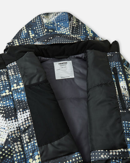 Inside view of the soft black Reima Tirro kids' waterproof ski jacket, showing the smooth winter lining, internal mesh goggle pocket, zippered chest pocket, and Reima name tag.