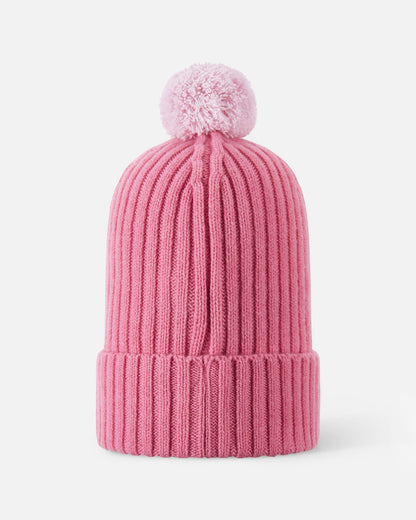 Back flat lay view of the soft coral Reima Topsu kids' wool blend beanie, showcasing the continuous vertical ribbed knit design and the cozy pom-pom engineered for cold weather warmth.