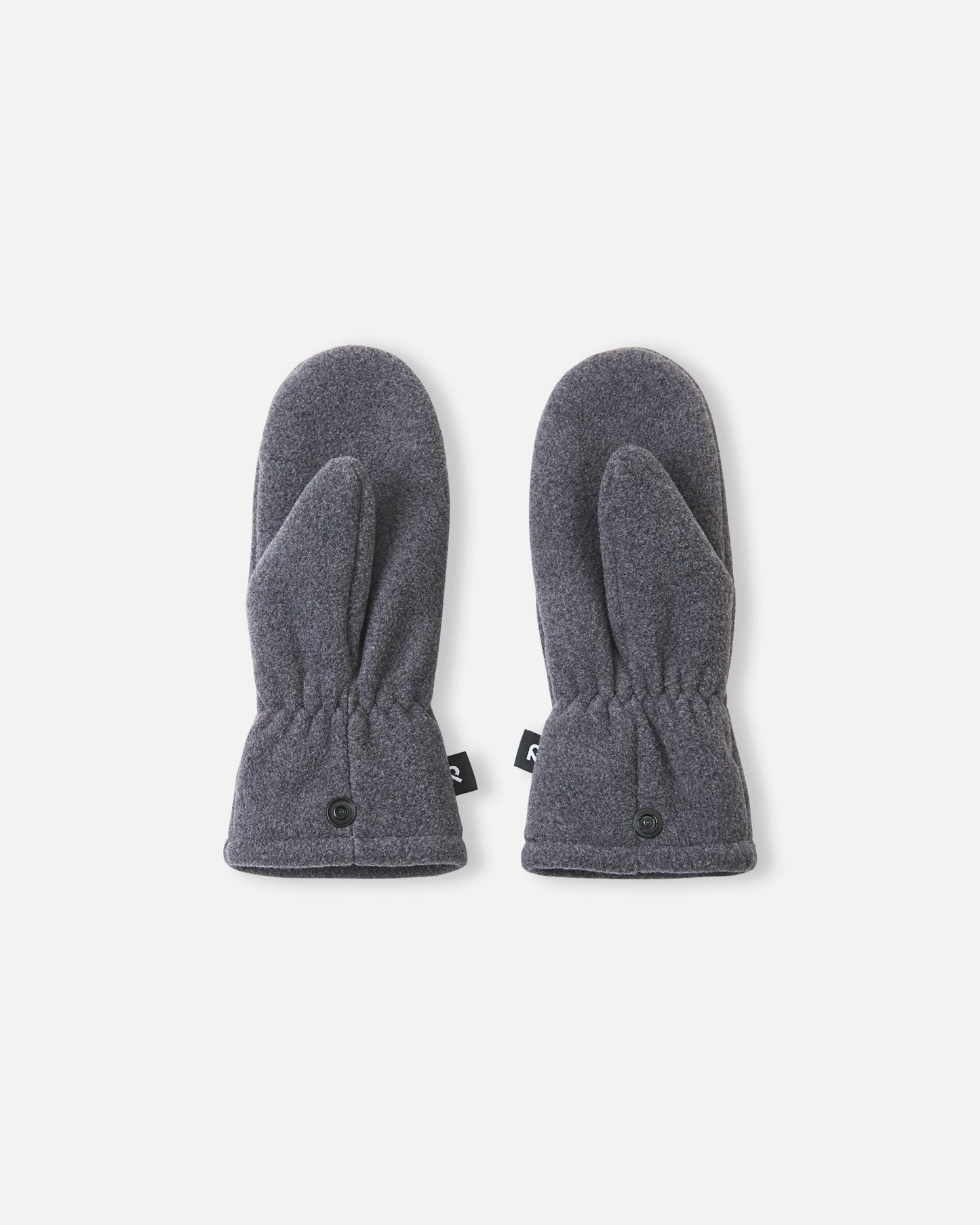 Flat lay view of the palms of the black melange Reima Tumpus kids' fleece mittens, showing the ergonomic thumb construction and practical snap fasteners at the cuffs.