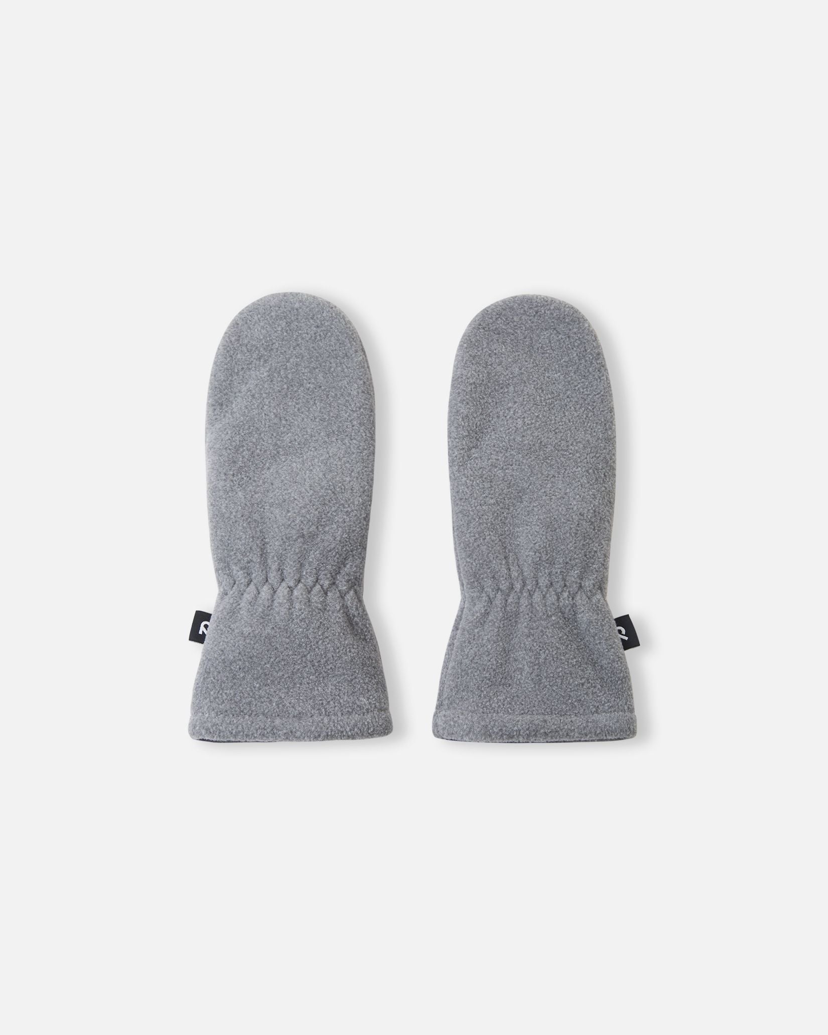 Flat lay view of the backs of the melange grey Reima Tumpus kids' fleece mittens, showing the soft, warm fabric and the gathered elastic wrist for a snug winter fit.