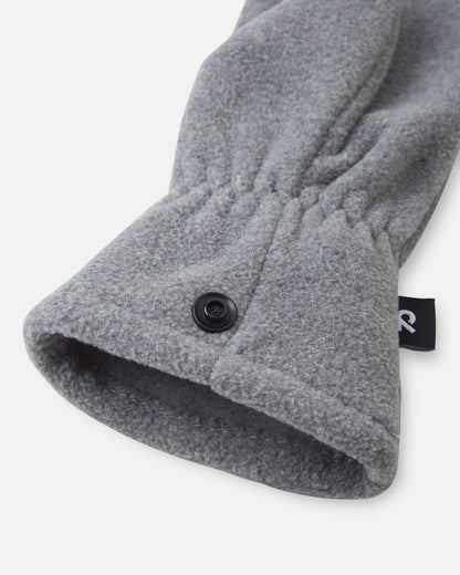 Close-up detail of the wrist gather and secure snap closure on the cuff of the melange grey Reima Tumpus kids' warm fleece mitten.