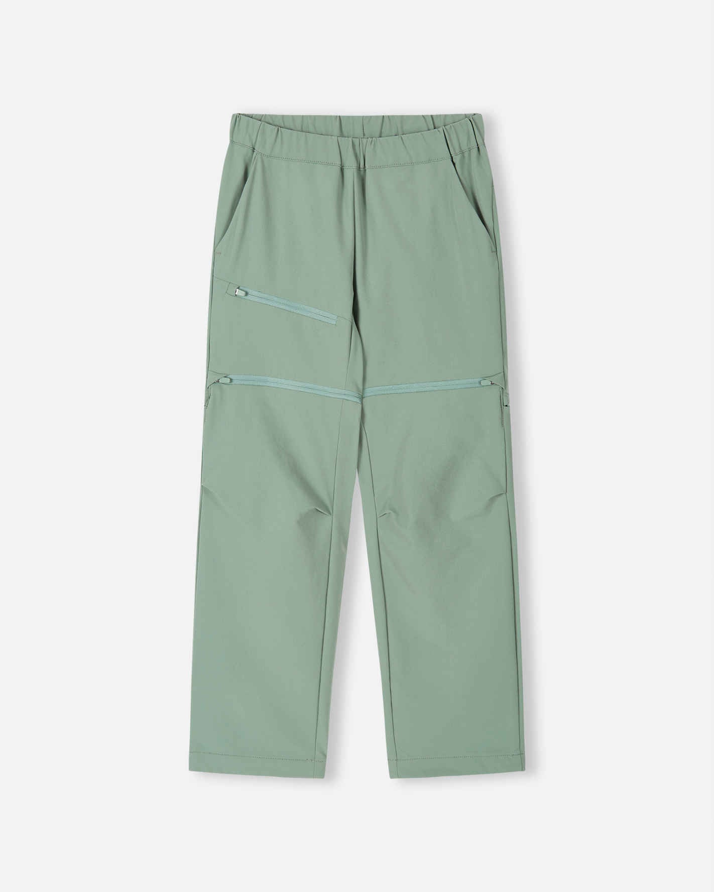 Front view of the Reima Tuplat kids' convertible hiking pants in stone green, featuring a comfortable elastic waist, a zippered thigh pocket, and discrete zip-off legs to easily convert into summer shorts.